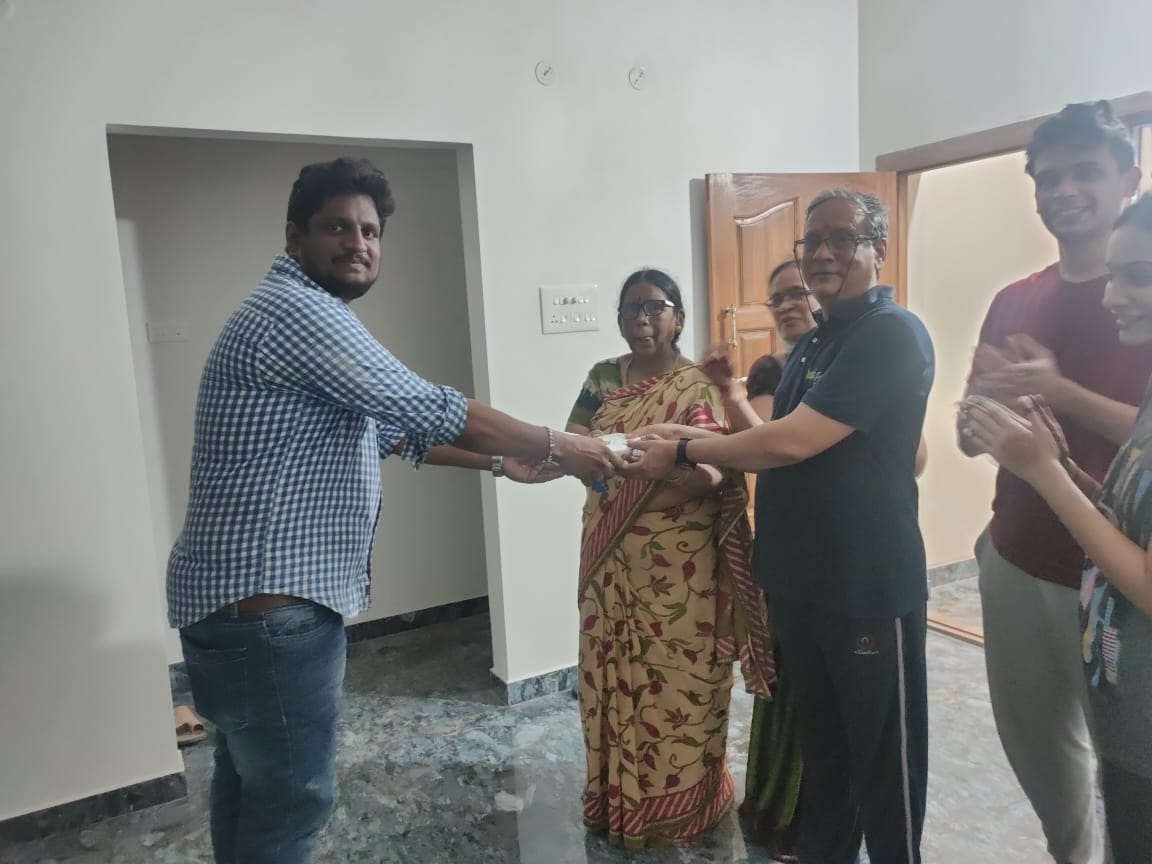 Happy client receiving keys to their new home from KKR Developers and Foundations